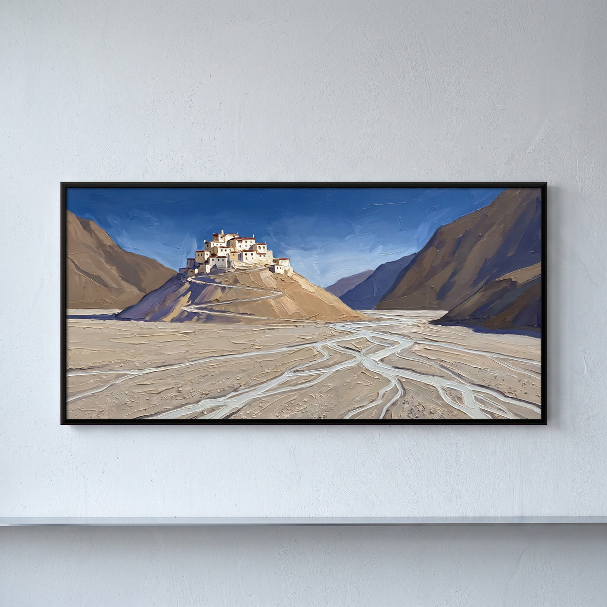 Himalayan Monastery Above a Braided River - framed canvas art hung on a wall