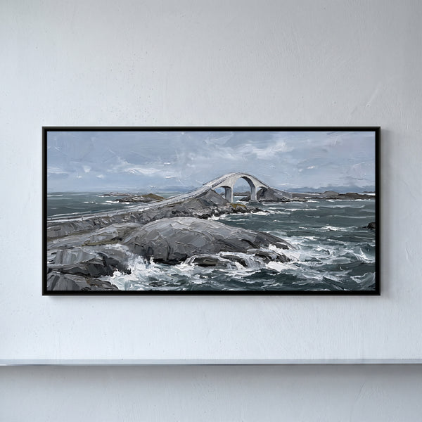 Curved Arched Bridge over a Rocky Coastline