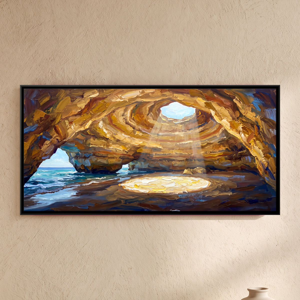 Sunlight in a Golden Sea Cave - framed canvas art hung on a wall