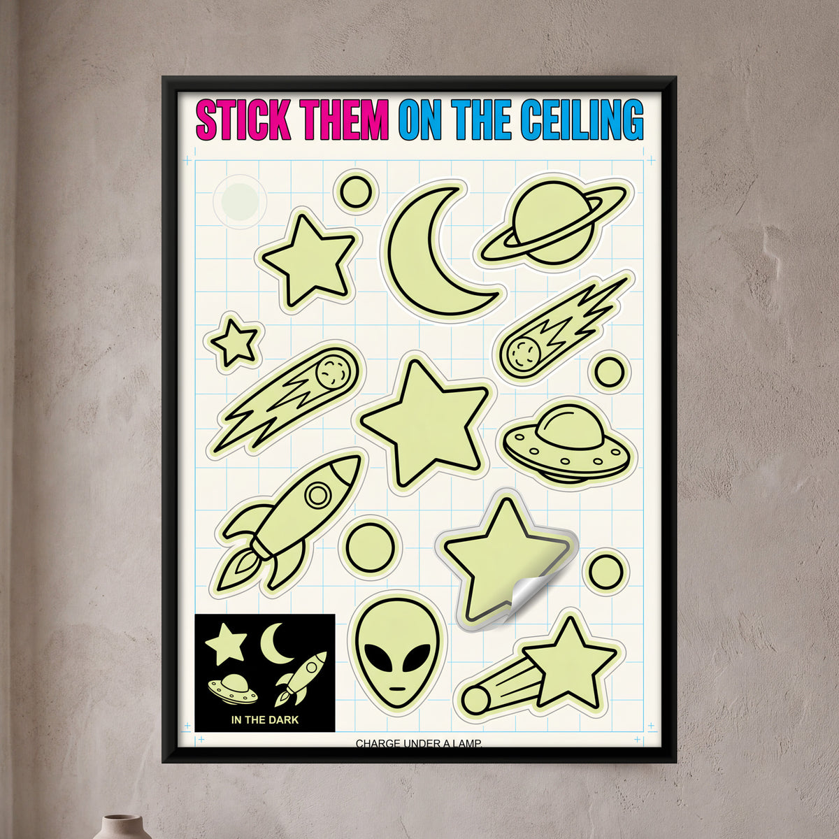 Glow in the Dark Space Stickers - framed canvas art hung on a wall