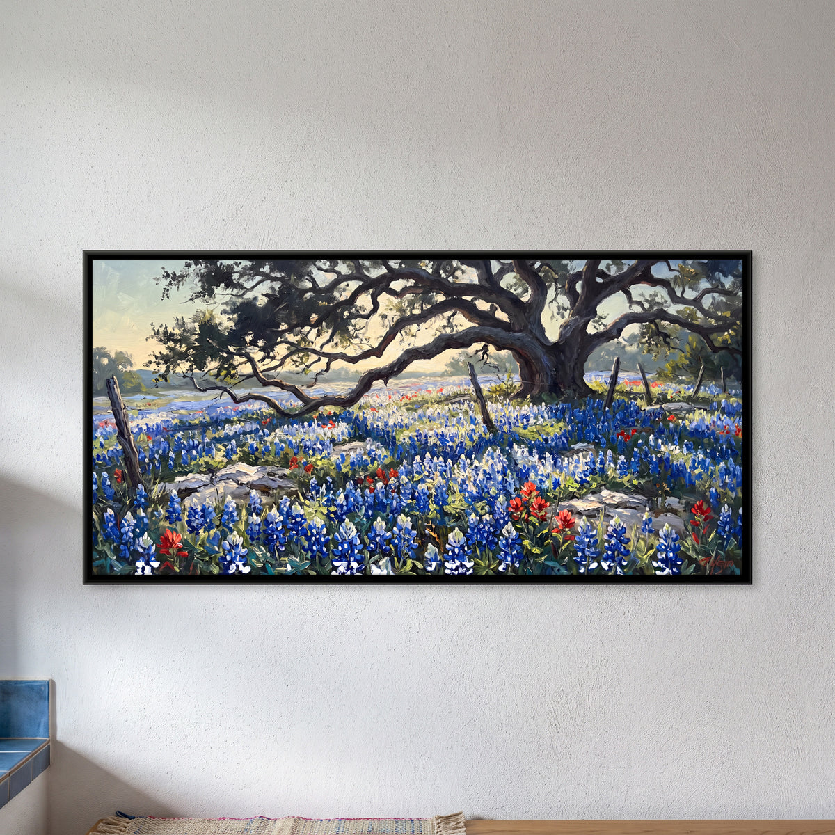 Bluebonnets Beneath a Spreading Oak - framed canvas art hung on a wall
