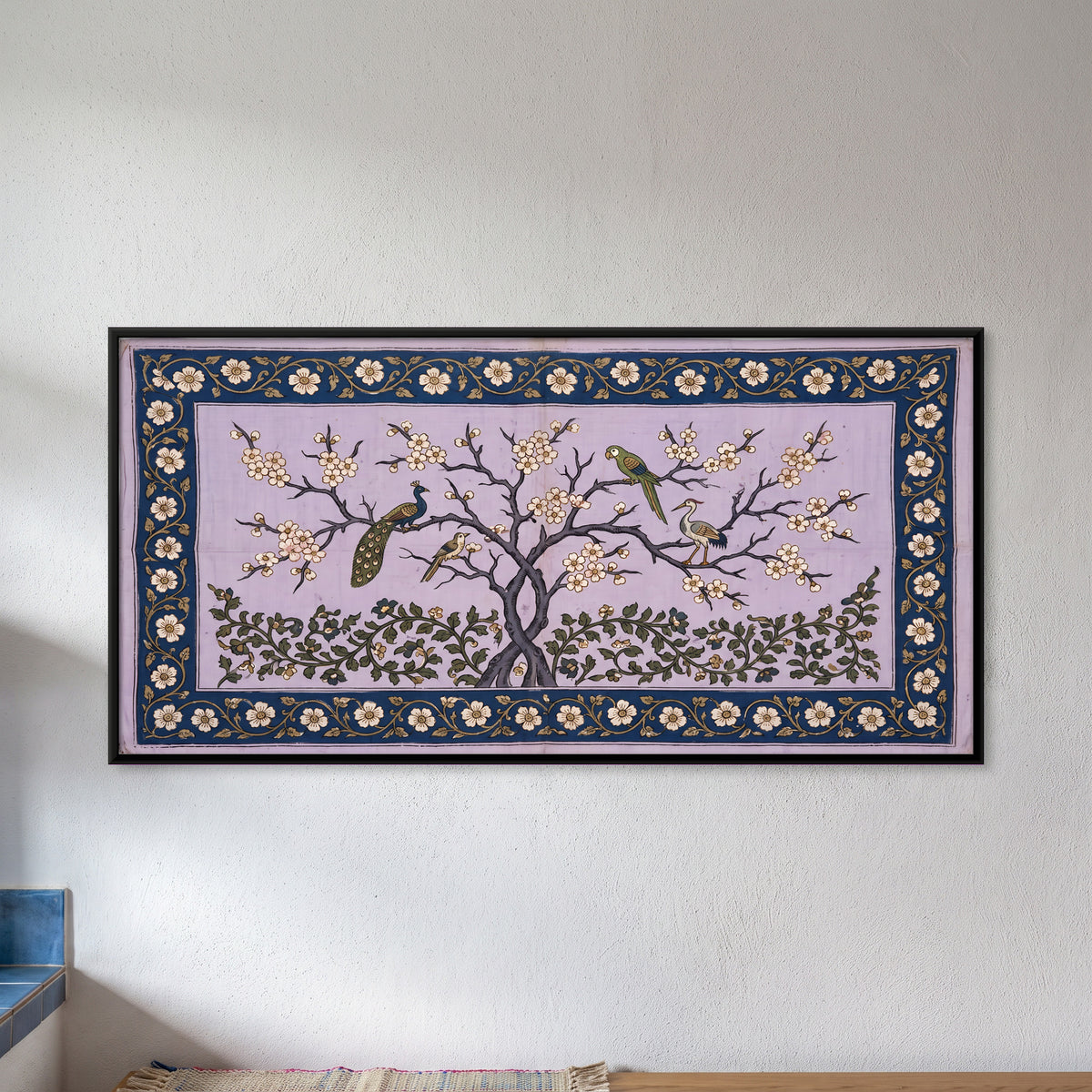 Peacock Under a Blossoming Tree - framed canvas art hung on a wall