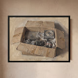 Cardboard Box Filled with Old Electronics in Sand