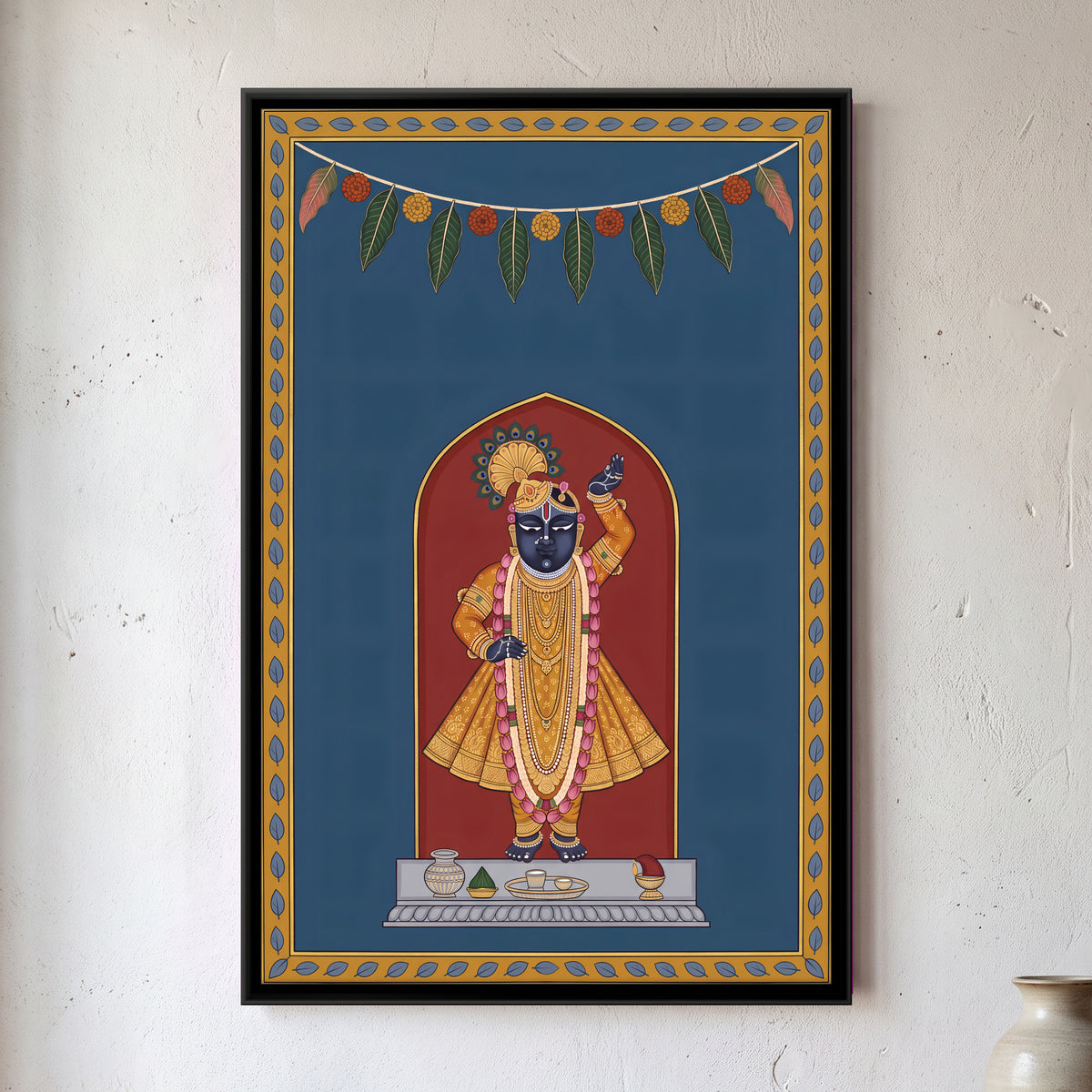 Shrinathji with Mango Leaf Toran - framed canvas art hung on a wall