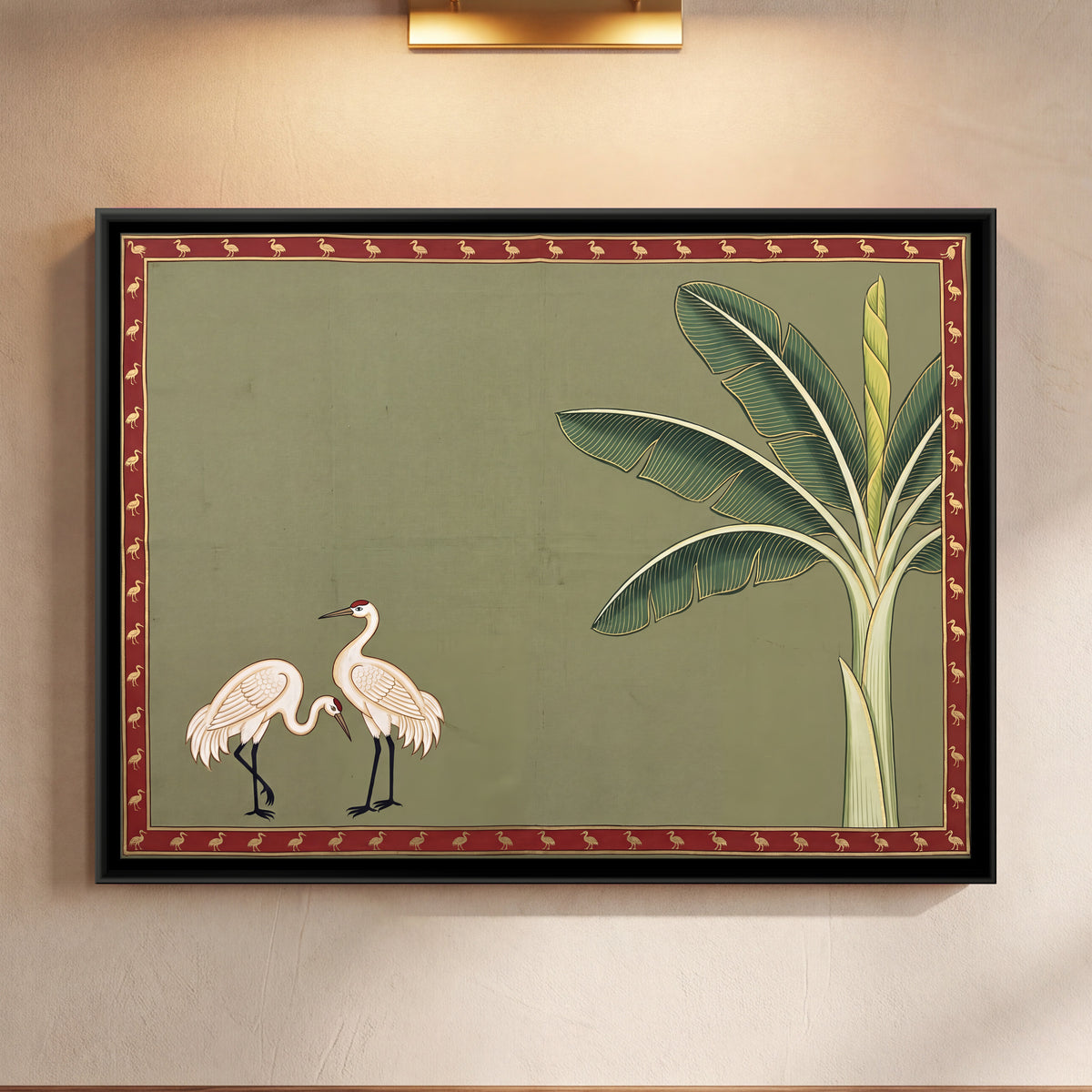 Cranes Beside a Banana Tree - framed canvas art hung on a wall