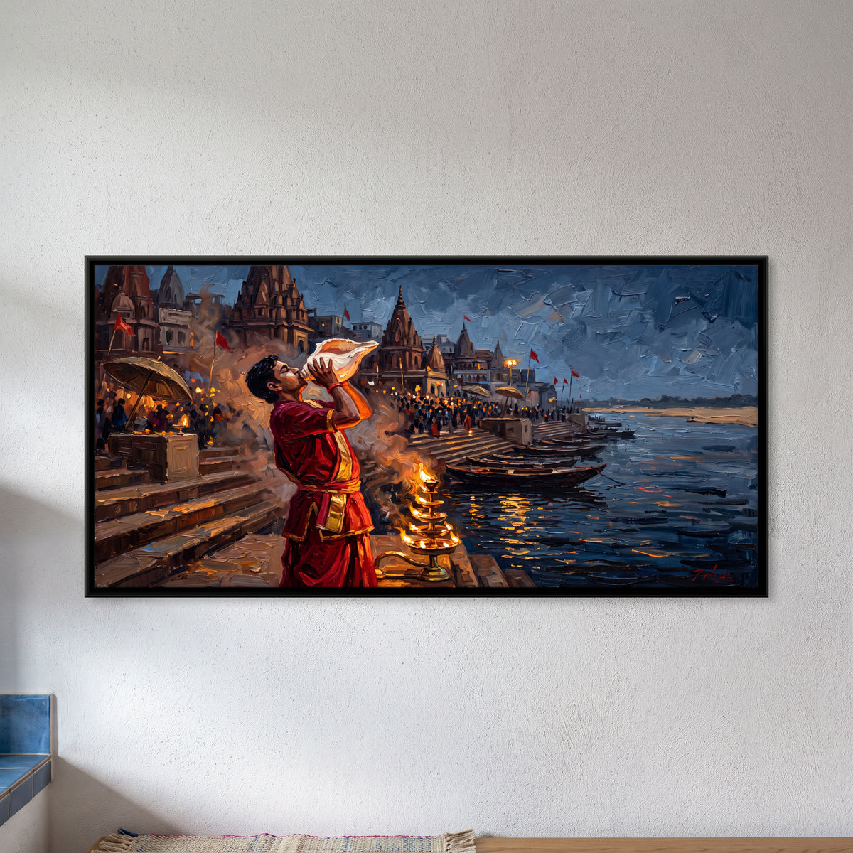 Blowing the Conch at Ganga Aarti - framed canvas art hung on a wall