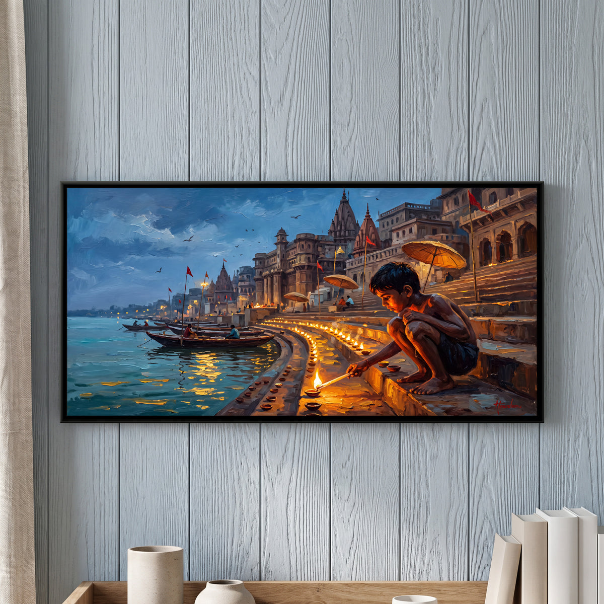 Boy Lighting Diyas on the Ghat - framed canvas art hung on a wall