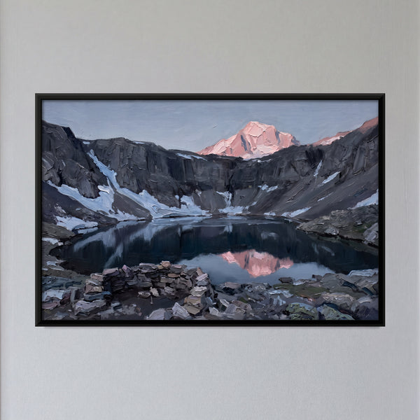 Mountain Lake Reflecting a Sunlit Peak