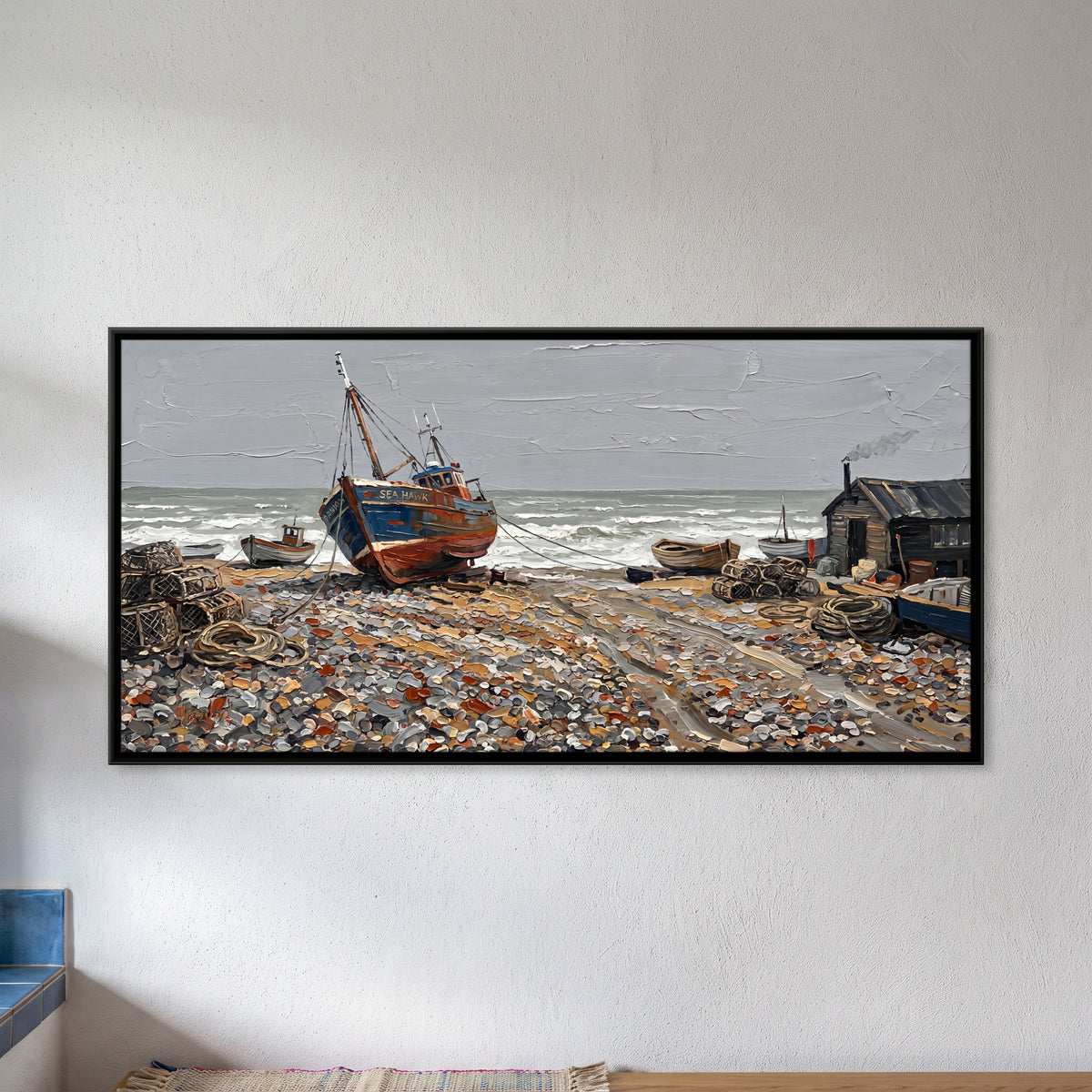 Fishing Boat on a Shingle Beach - framed canvas art hung on a wall