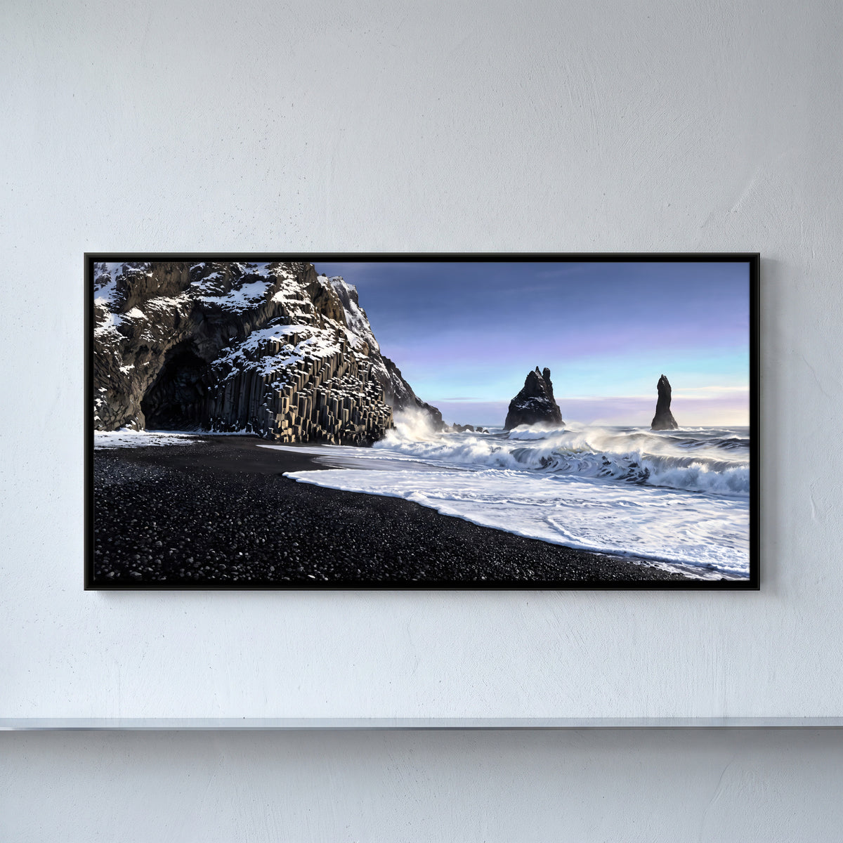 Black Sand Beach and Sea Stacks - framed canvas art hung on a wall