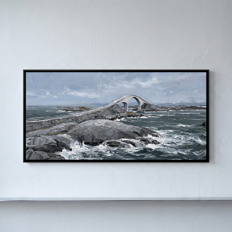 Arched Bridge over a Rocky Shore - framed canvas art hung on a wall