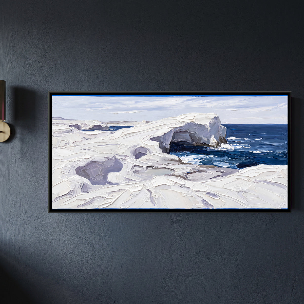 White Rocks Above a Blue Sea - framed canvas art hung on a wall