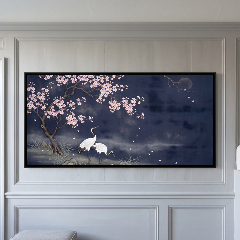 Cranes Beneath Moonlit Cherry Blossom - framed canvas art hung on a wall