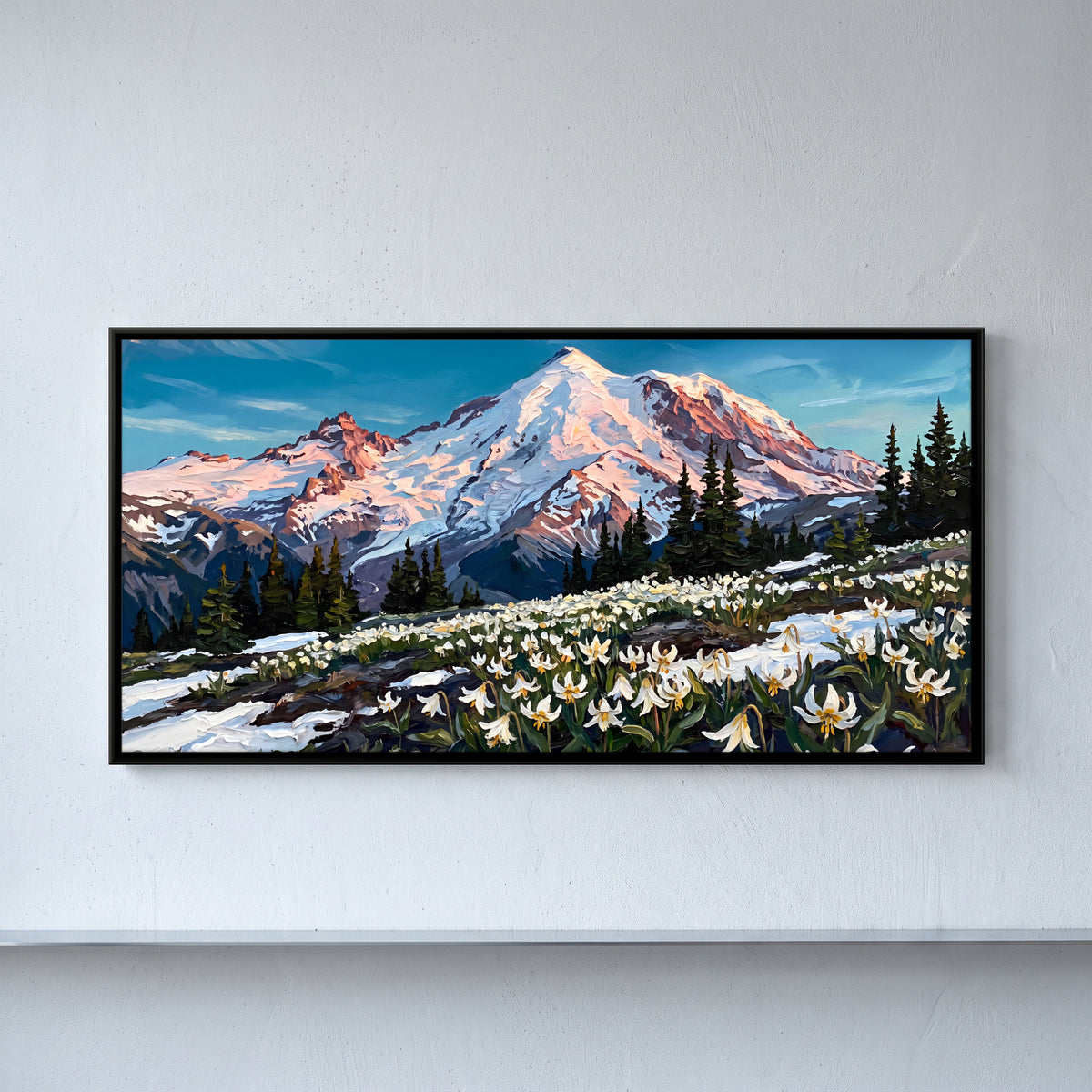 Avalanche Lilies Below a Snow Peak - framed canvas art hung on a wall