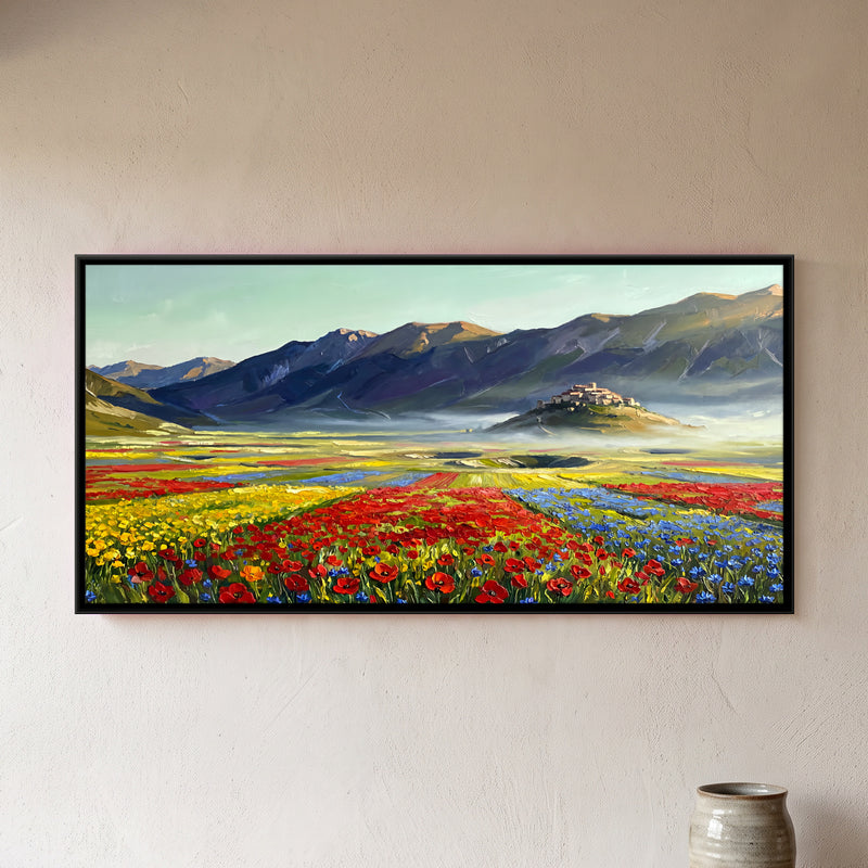 Flower Fields Below a Hilltop Village - framed canvas art hung on a wall
