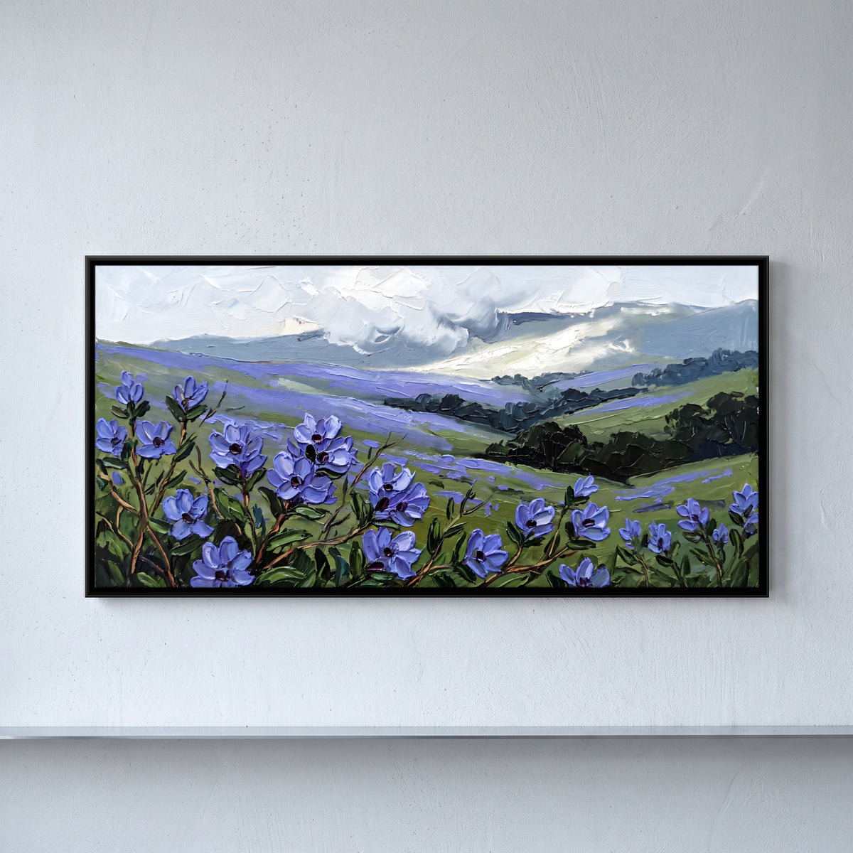 Blue Wildflowers on Misty Hills - framed canvas art hung on a wall