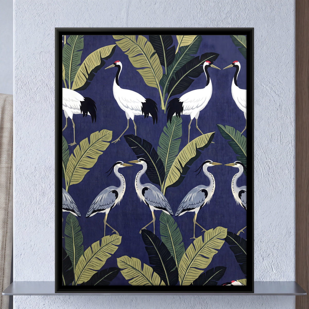Cranes and Herons Among Banana Leaves - framed canvas art hung on a wall