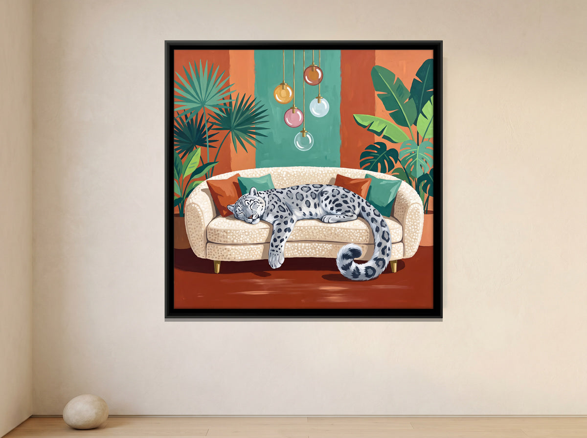 Snow Leopard Asleep on a Sofa - canvas art shown in a second room setting