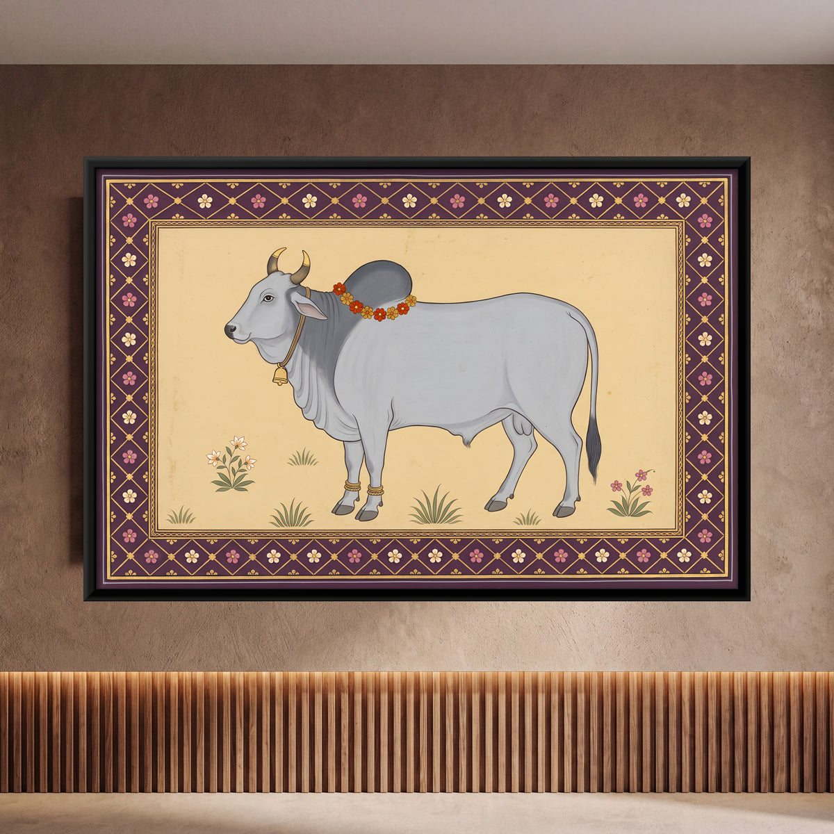 Garlanded Zebu Bull - framed canvas art hung on a wall