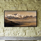 Snow-capped Mountain Range in Golden Light