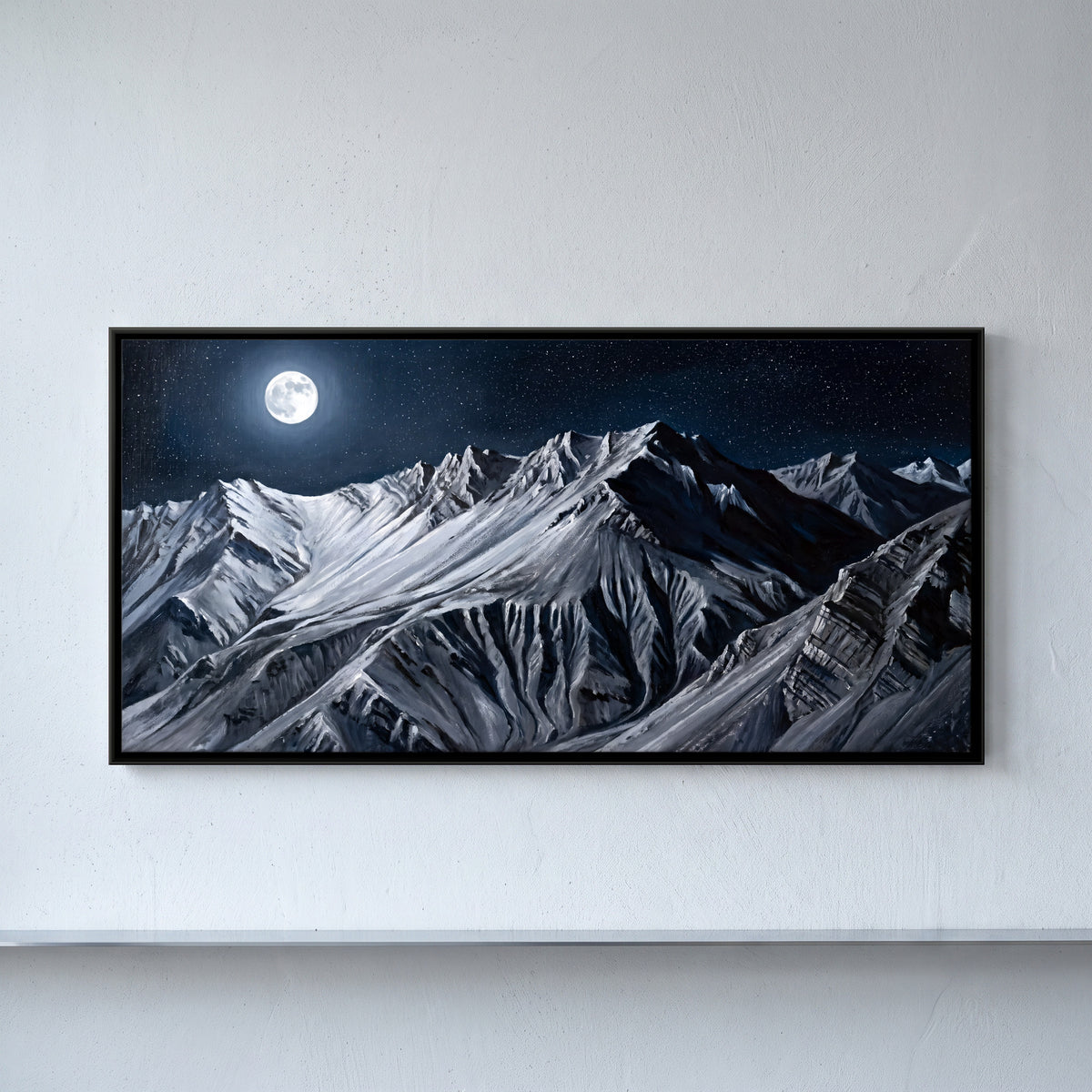 Full Moon Over Snow Peaks - framed canvas art hung on a wall