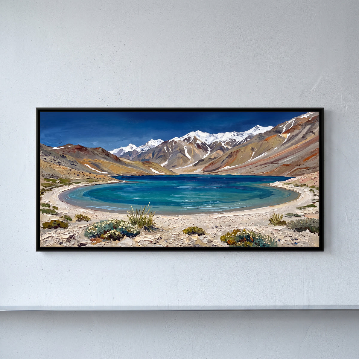 Turquoise Lake Below Snow Peaks - framed canvas art hung on a wall