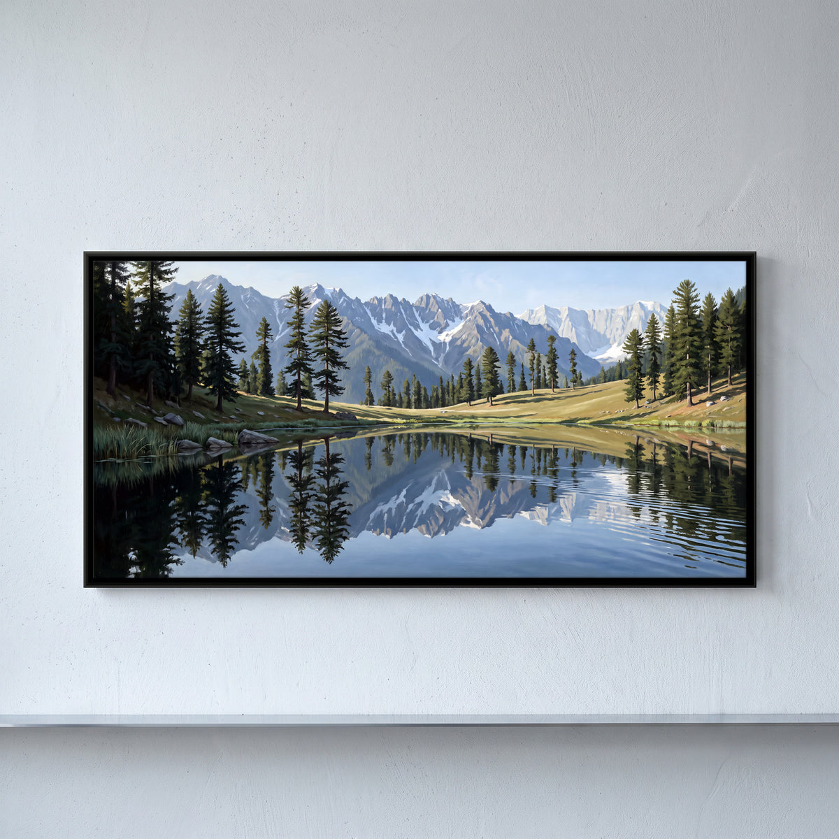 Snow Range Reflected in a Lake - framed canvas art hung on a wall