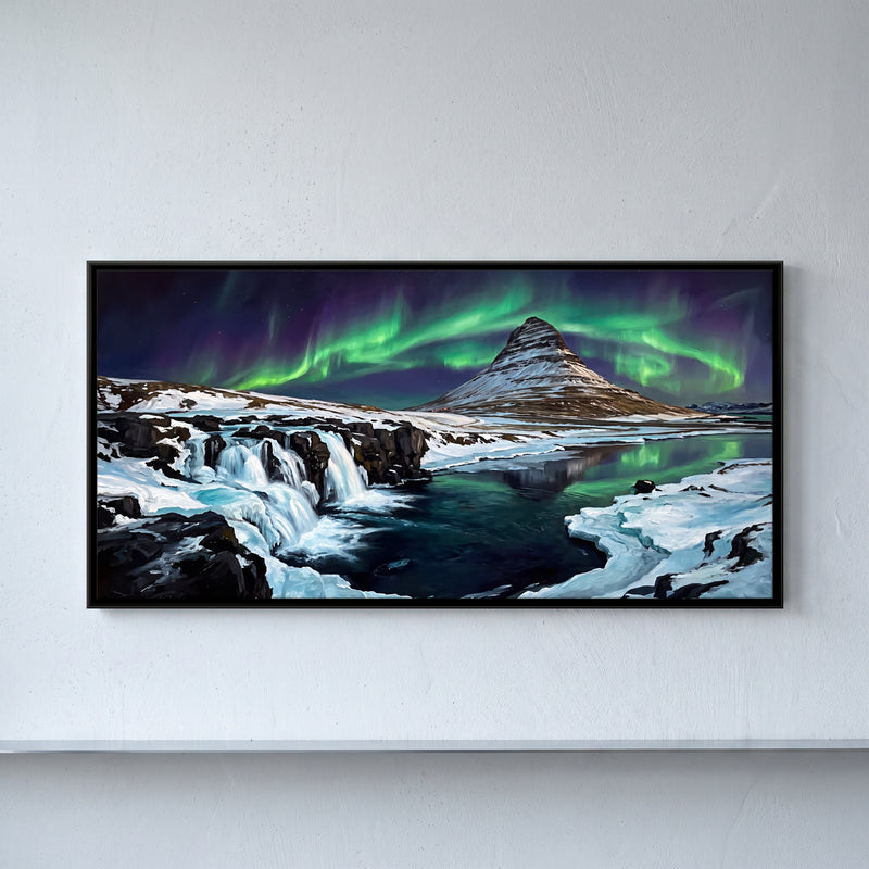 Aurora Over a Mountain Waterfall - framed canvas art hung on a wall