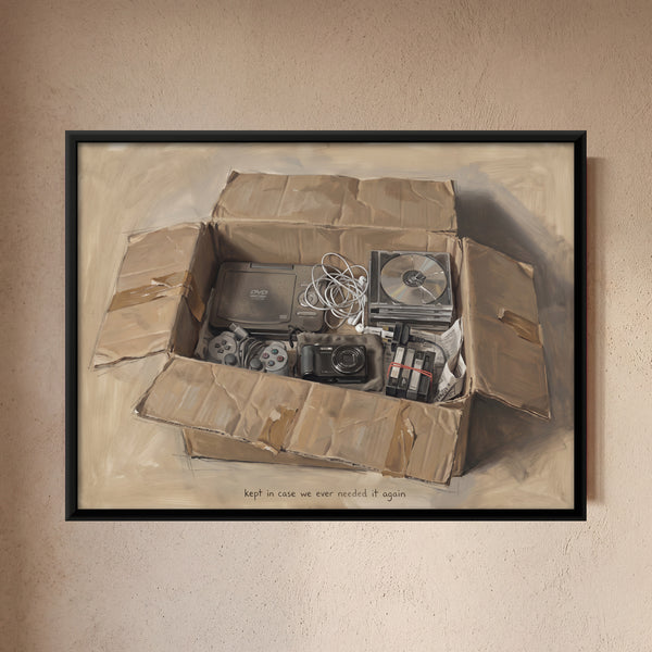 Cardboard Box Filled with Old Electronics in Sand