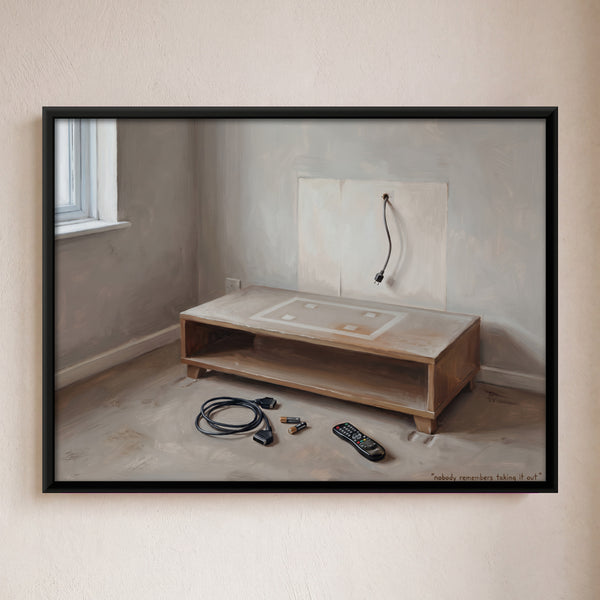 Empty TV Stand with Cables and Remote on Floor