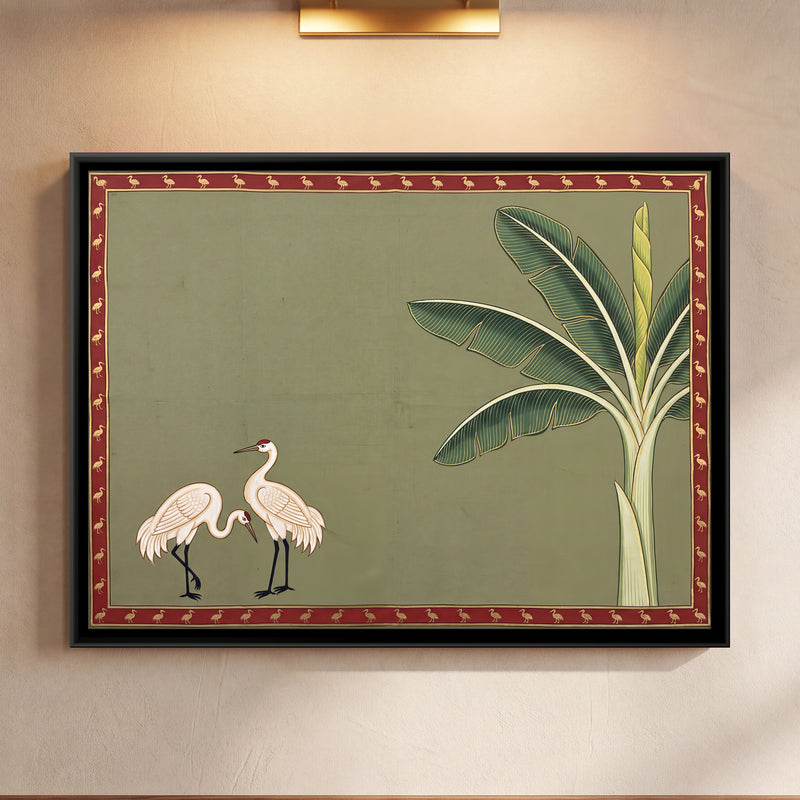 Cranes Beside a Banana Tree - framed canvas art hung on a wall