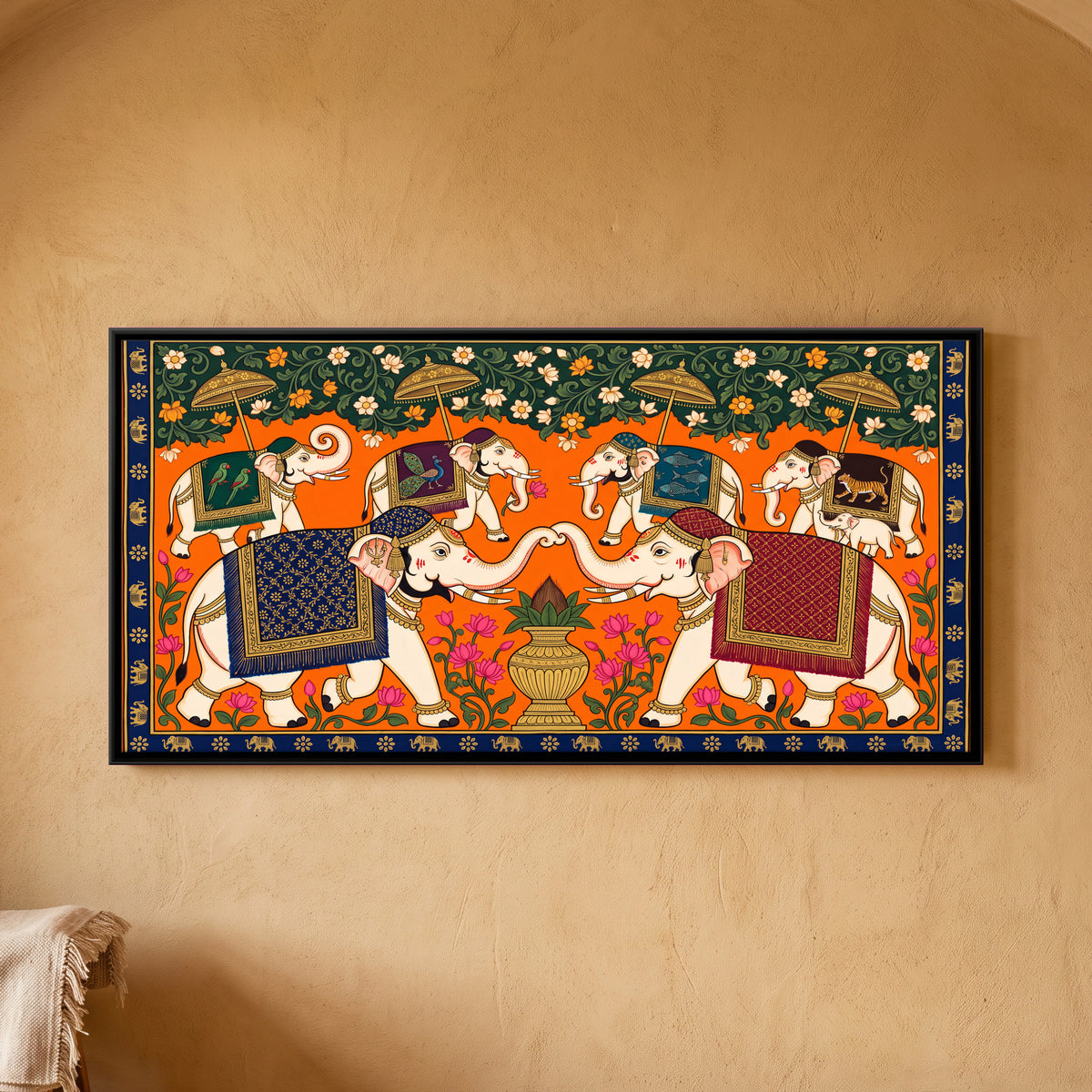 Elephants with a Kalash - framed canvas art hung on a wall