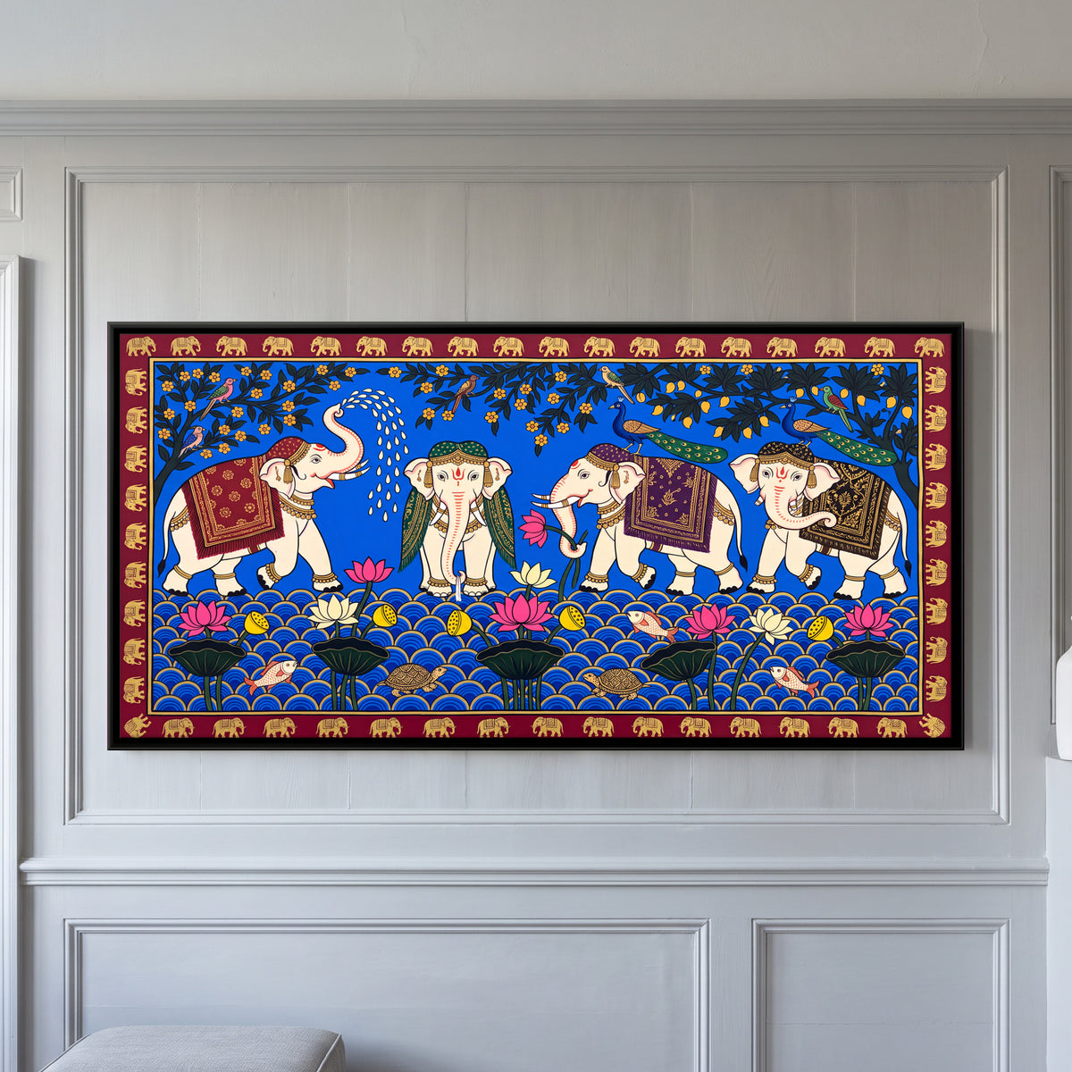 Elephants at a Lotus Pond - framed canvas art hung on a wall