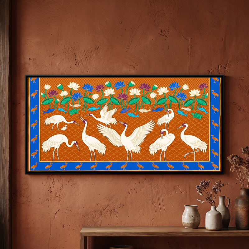 Cranes in a Lotus Pond - framed canvas art hung on a wall