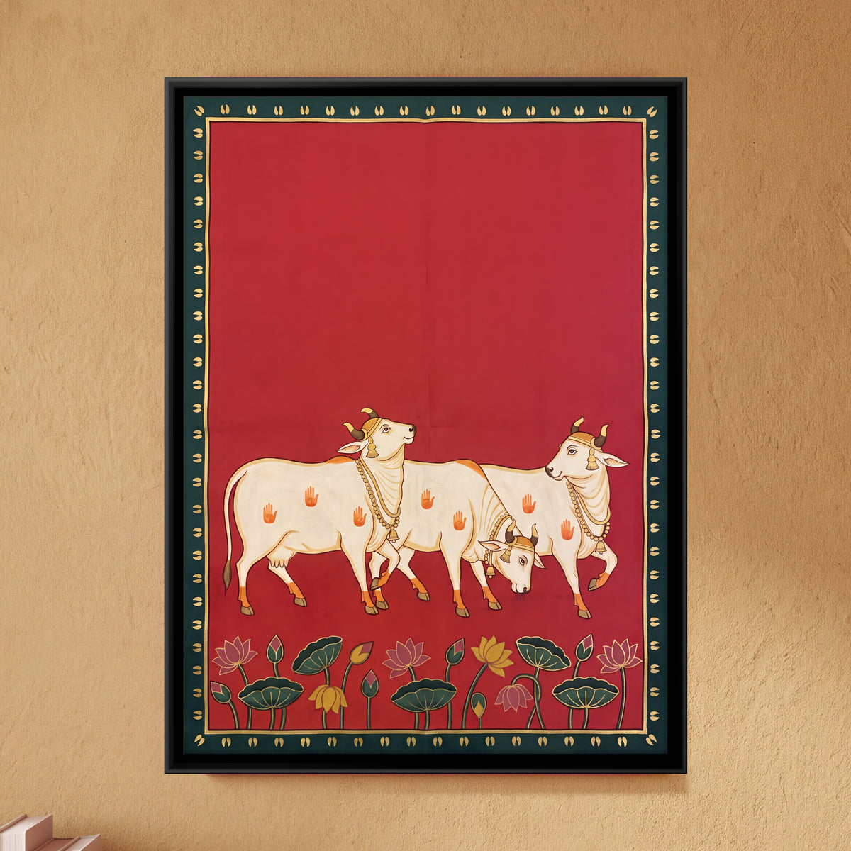 Three Cows with Lotuses - framed canvas art hung on a wall