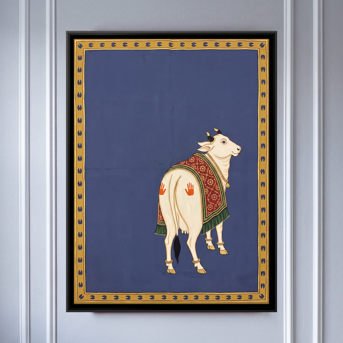 Gau Mata Looking Back - framed canvas art hung on a wall