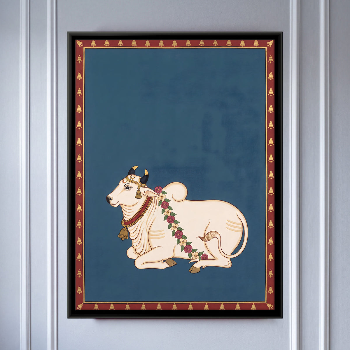 Garlanded Nandi Bull - framed canvas art hung on a wall