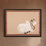 Resting White Cow with Floral Garland