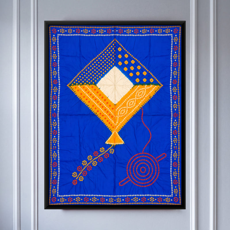 Kite and Thread Spool - framed canvas art hung on a wall