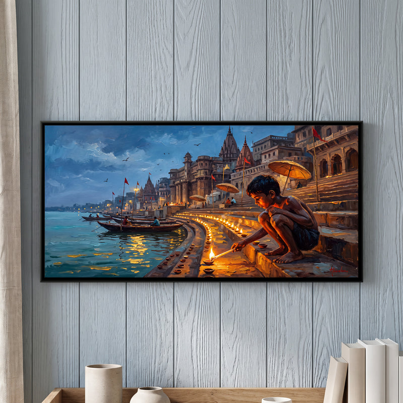 Boy Lighting Diyas on the Ghat - framed canvas art hung on a wall