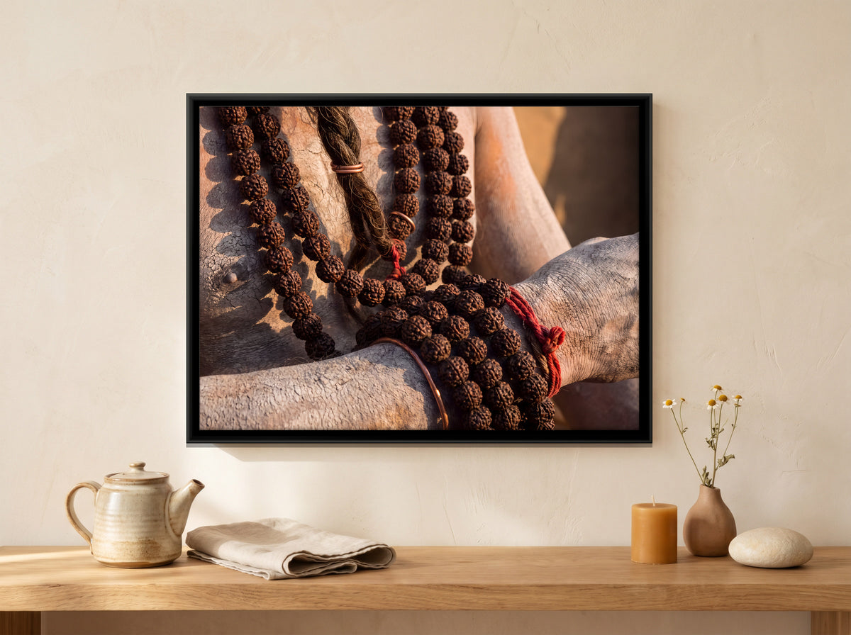 Rudraksha Beads in Hand - canvas art shown in a styled room