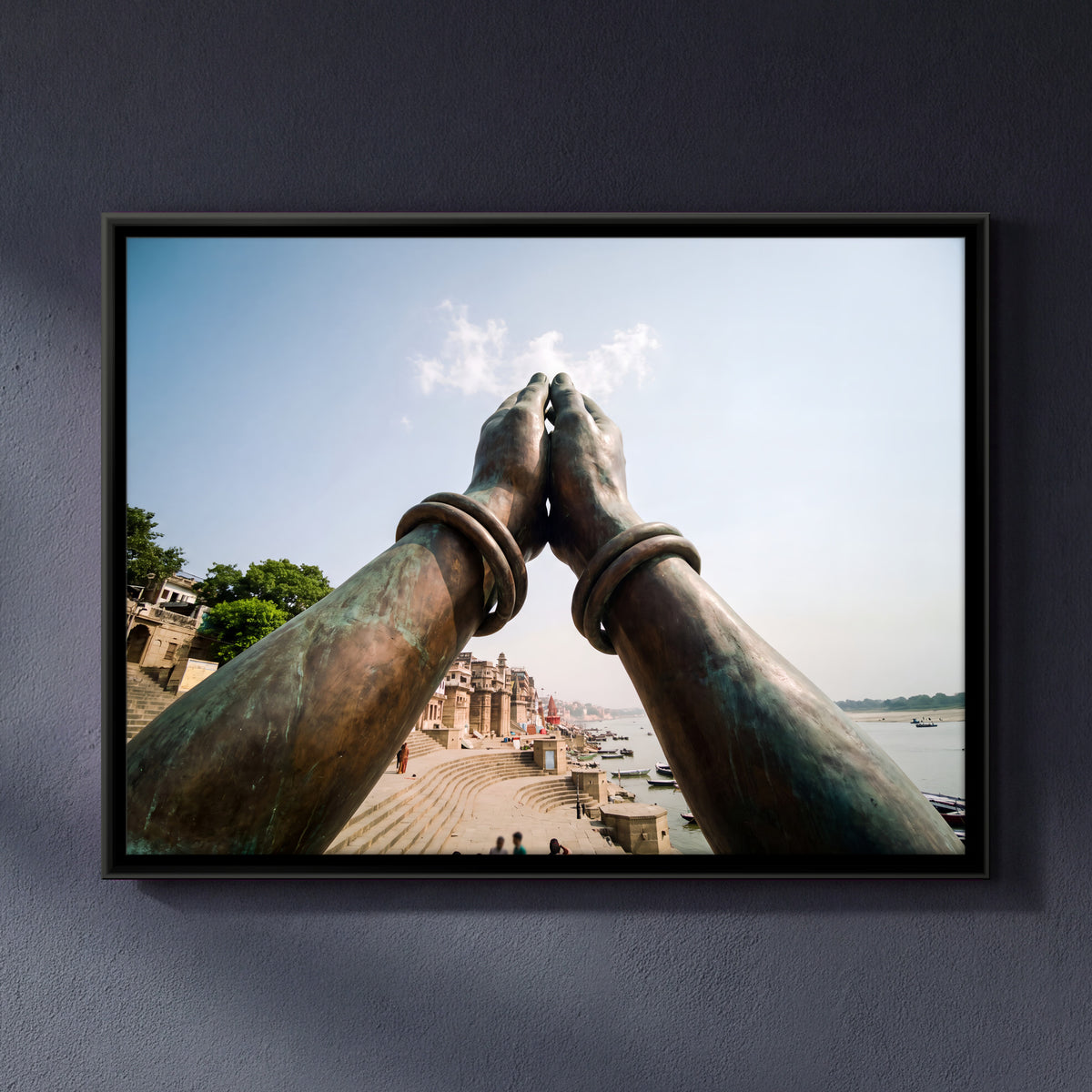 Namaste Hands Above the Ghats - framed canvas art hung on a wall