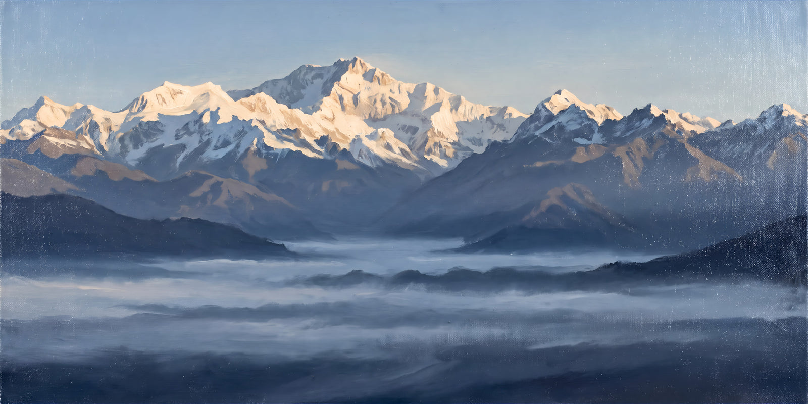 Himalayan ridge at first light above a valley filled with cloud