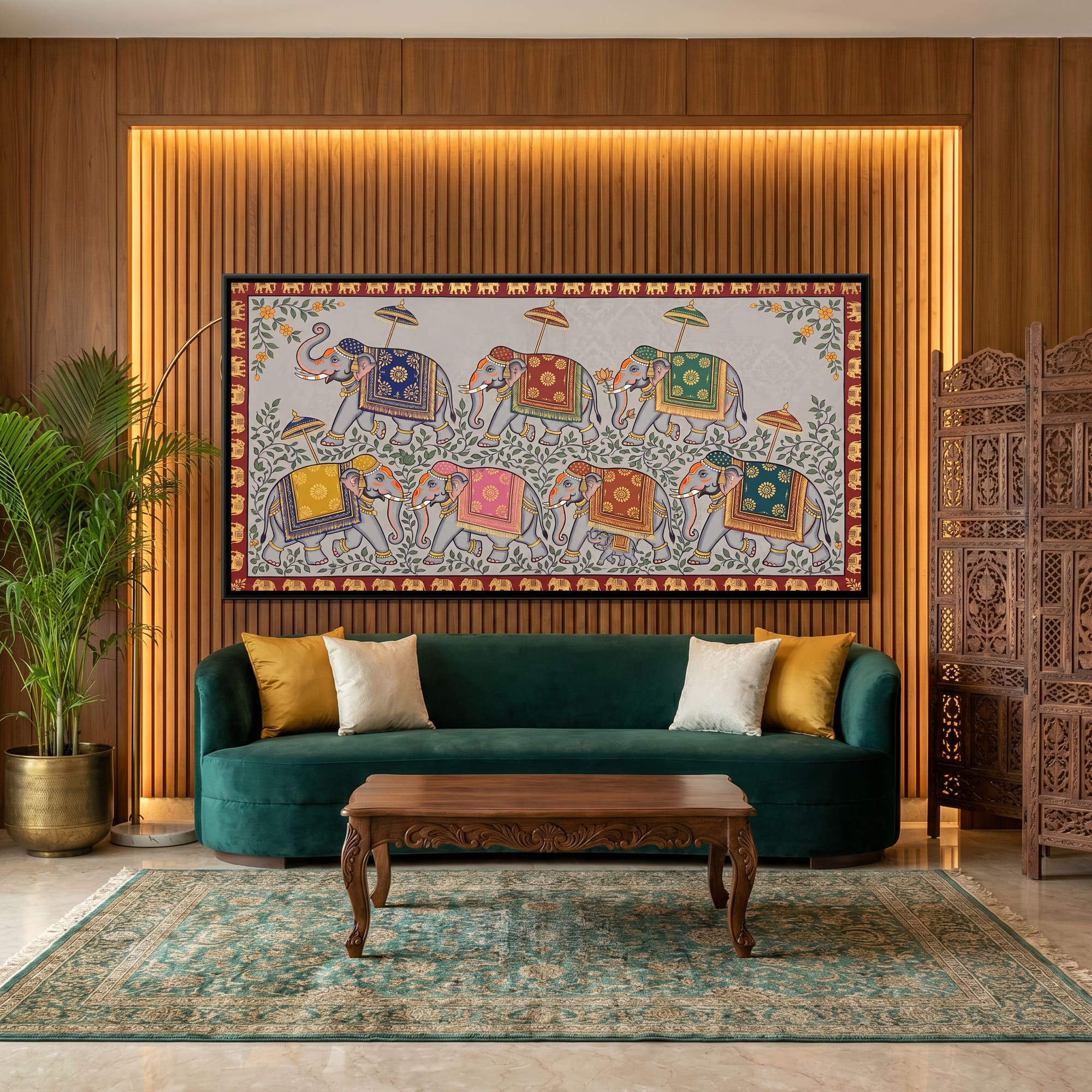 A wide pichwai canvas above a green velvet sofa in a teak-panelled Indian living room